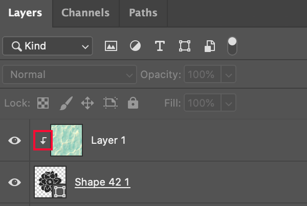 In layers, a down arrow indicates that layer is the clipping mask in Photoshop